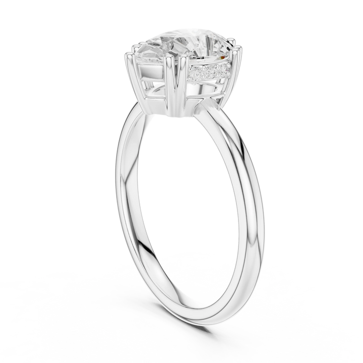Pear Cut Diamond Solitaire Engagement Ring with Hidden Accent Diamonds
