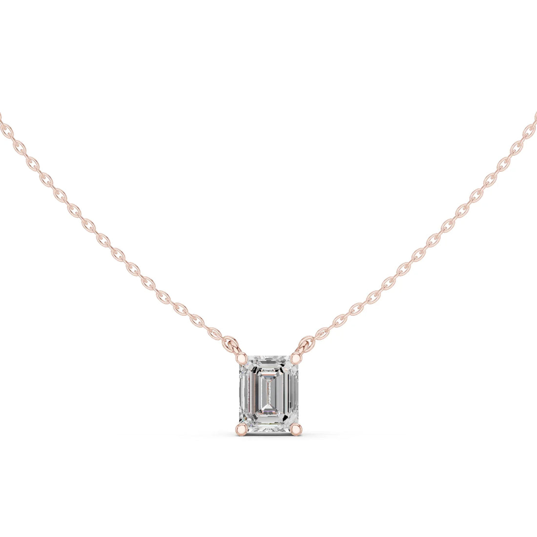 Emerald Elegance Solitaire Diamond Pendant