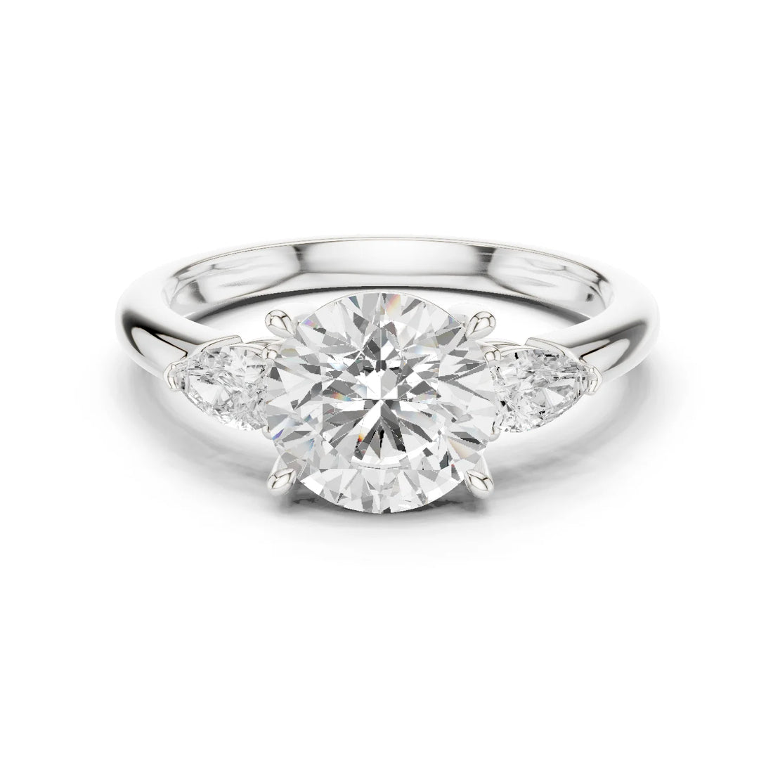 Round Cut Diamond Three-Stone Engagement Ring