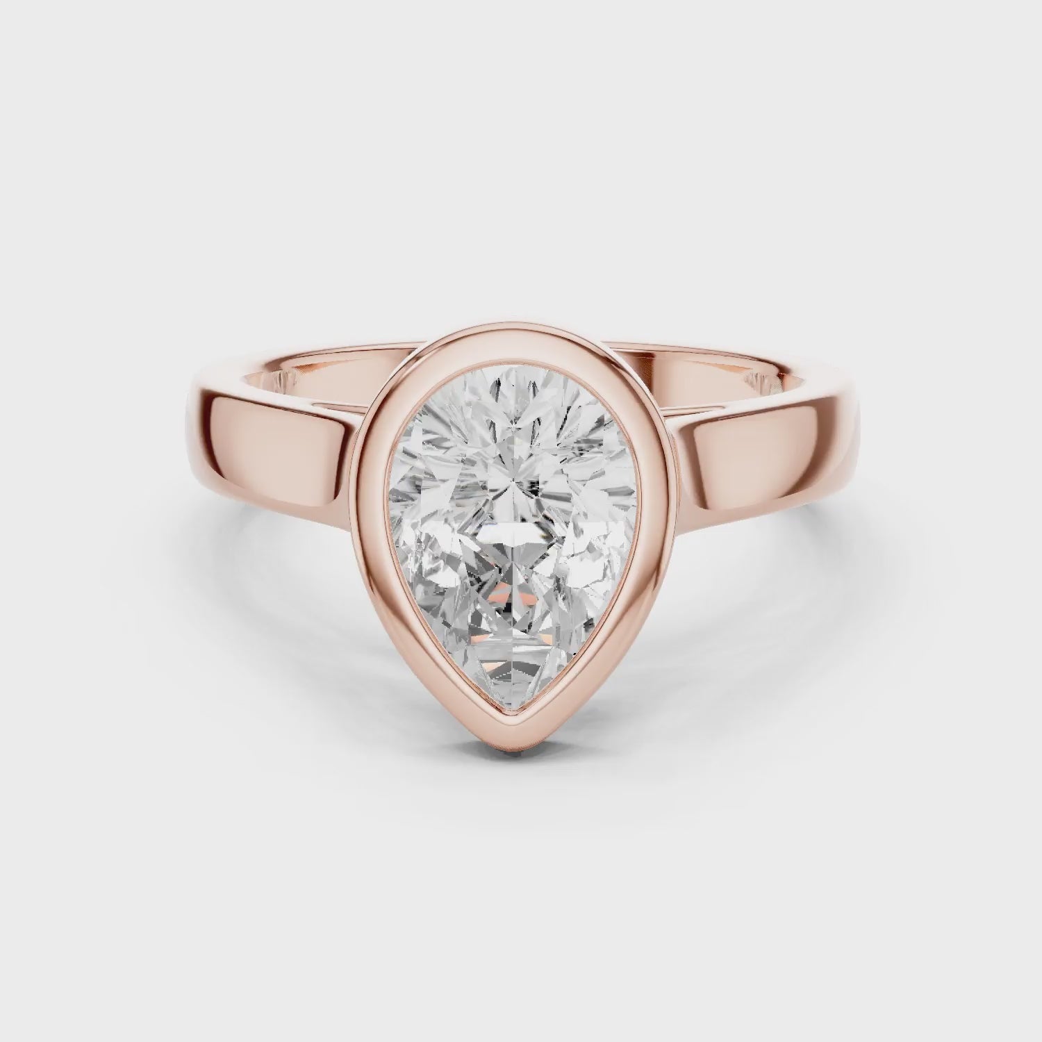 Pear Cut Diamond Bezel Solitaire Engagement Ring