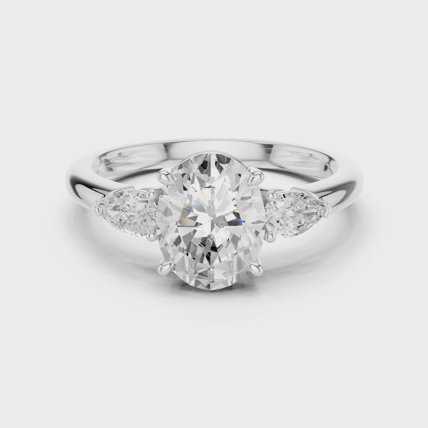 Oval Cut Diamond Three-Stone Engagement Ring