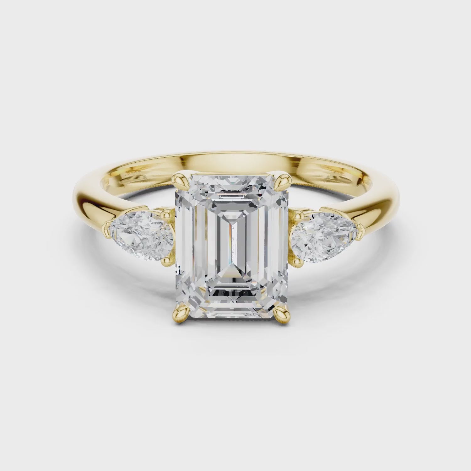 Emerald Cut Diamond Three-Stone Engagement Ring