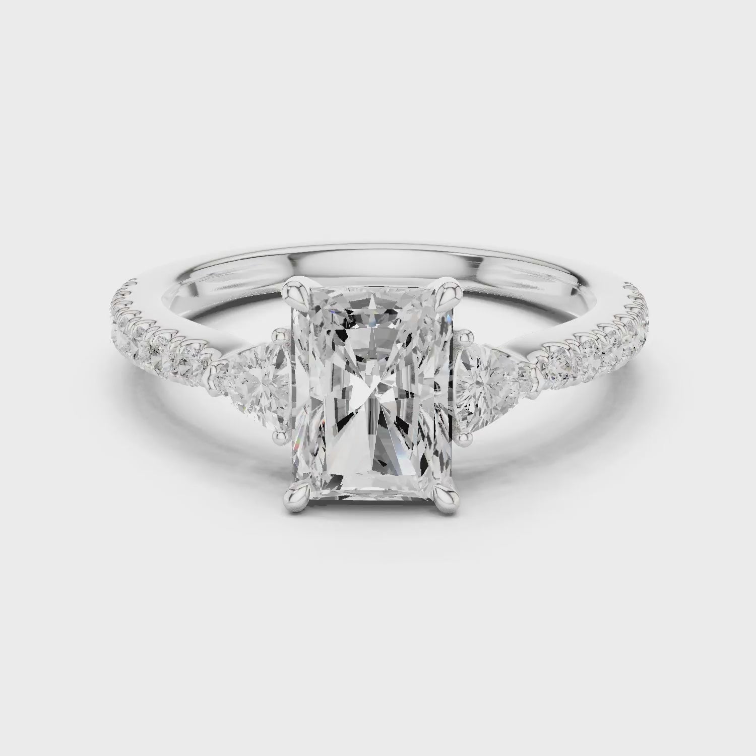 Radiant Cut Diamond Three-Stone Engagement Ring with Pave Band