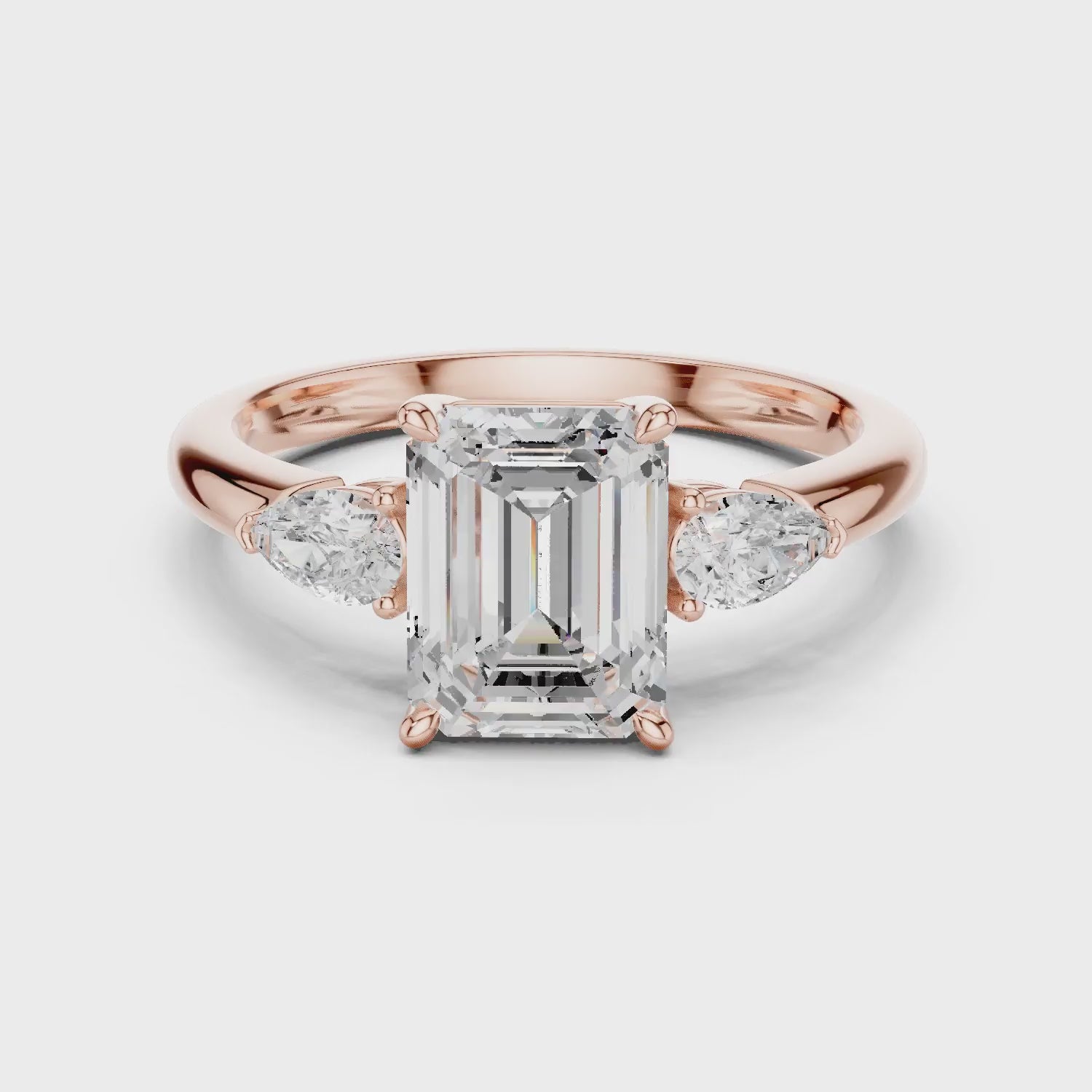 Emerald Cut Diamond Three-Stone Engagement Ring