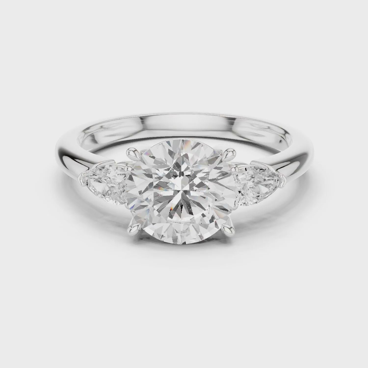 Round Cut Diamond Three-Stone Engagement Ring