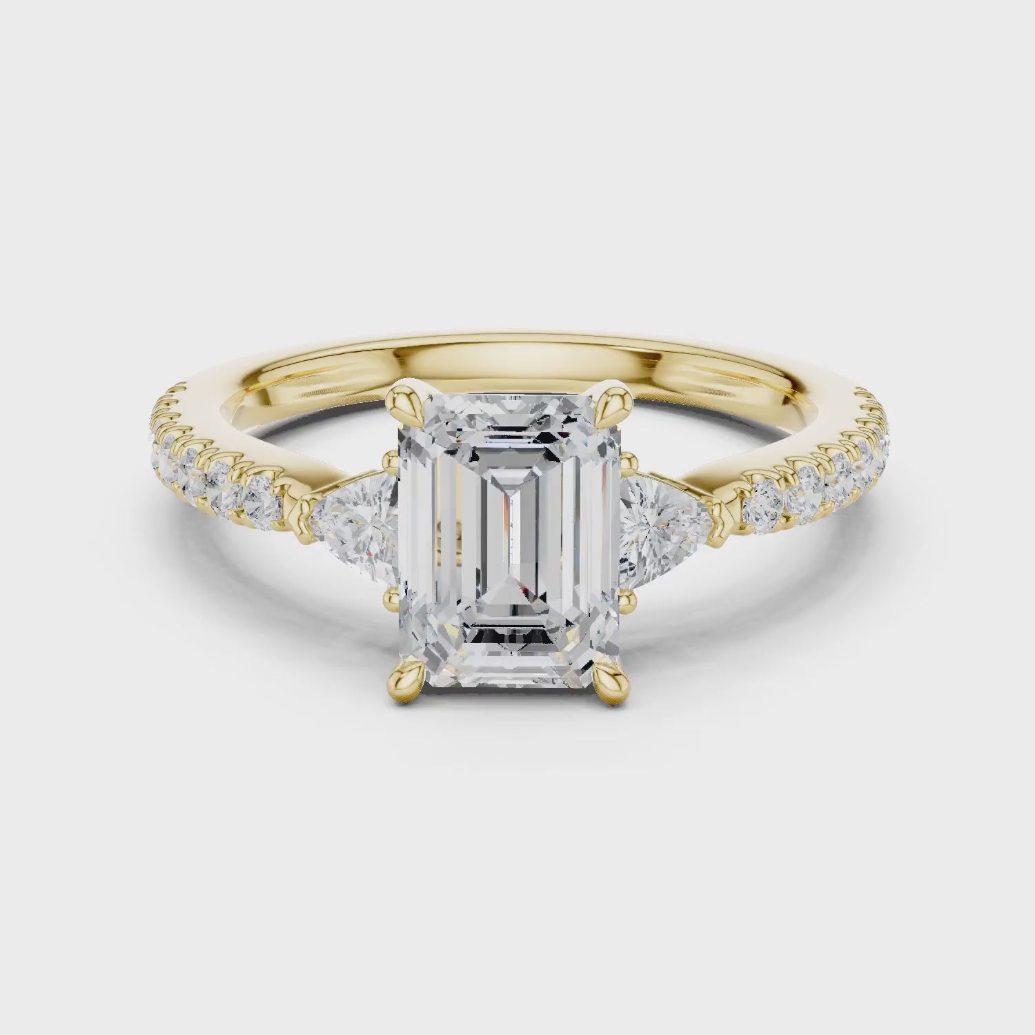 Emerald Cut Diamond Three-Stone Engagement Ring with Pave Band