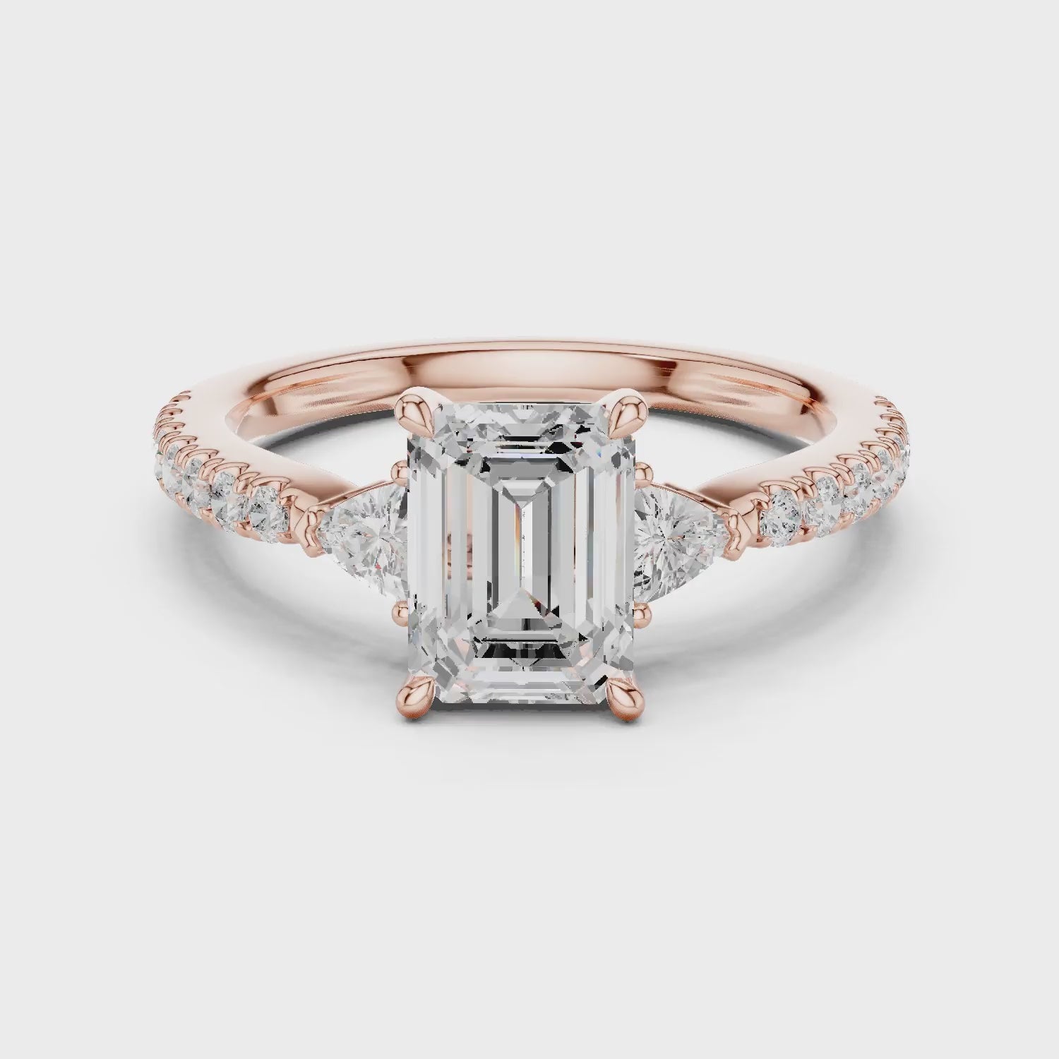 Emerald Cut Diamond Three-Stone Engagement Ring with Pave Band