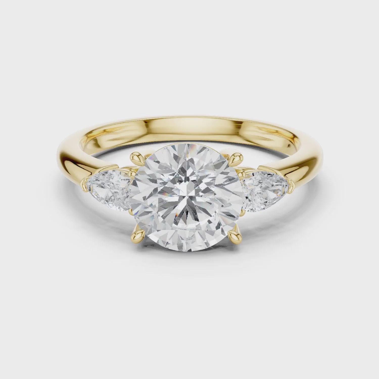 Round Cut Diamond Three-Stone Engagement Ring