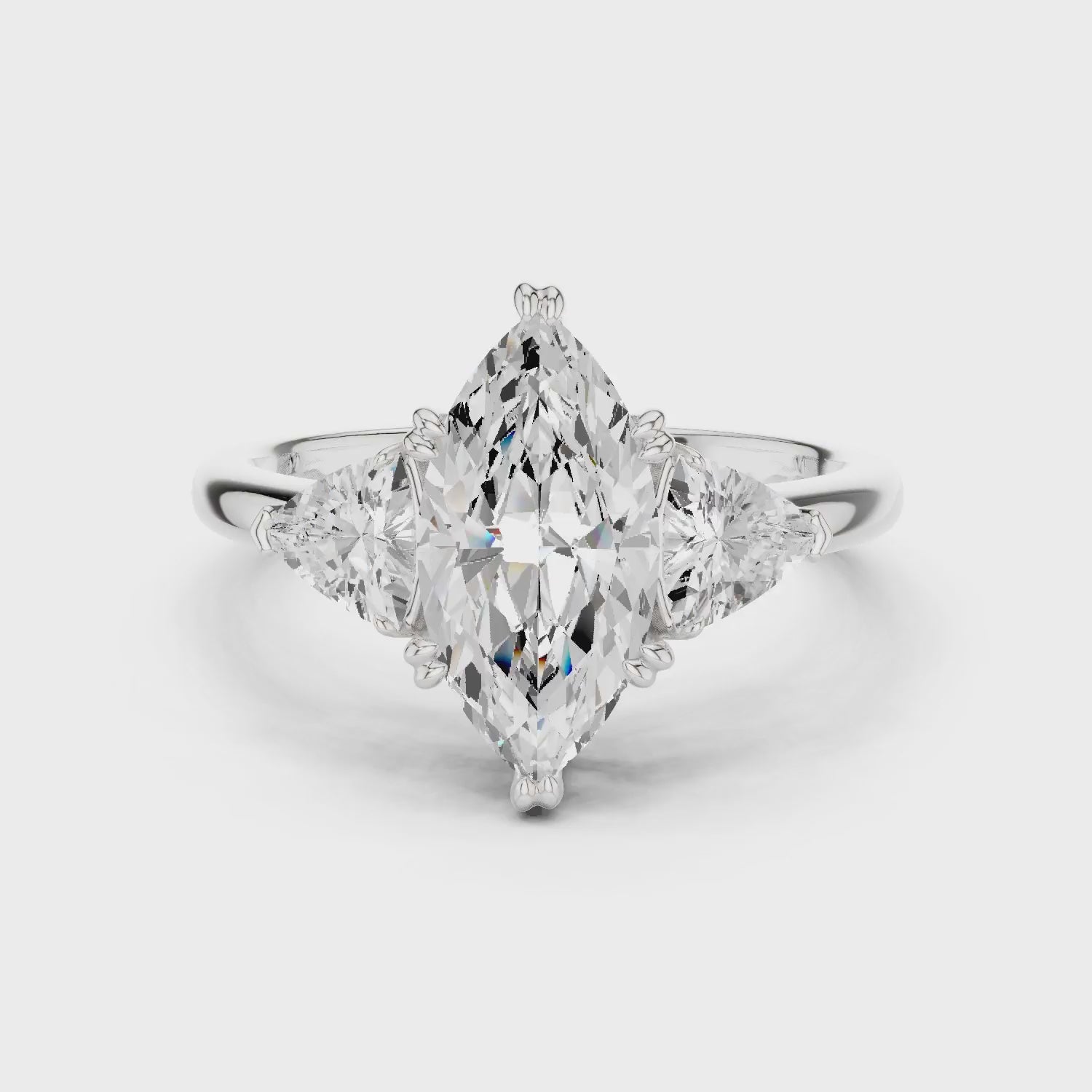 Marquise Cut Diamond Three Stone Engagement Ring