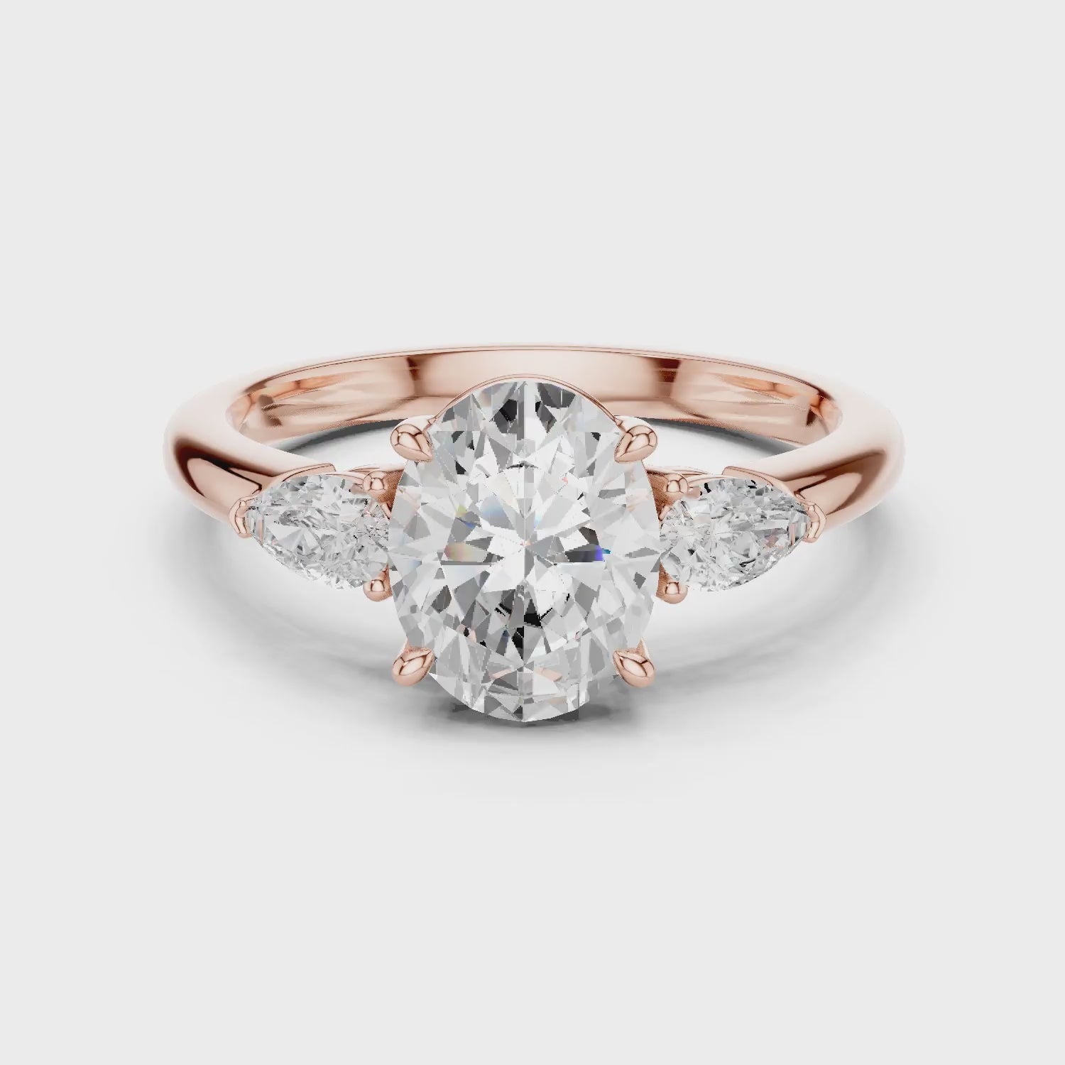 Oval Cut Diamond Three-Stone Engagement Ring