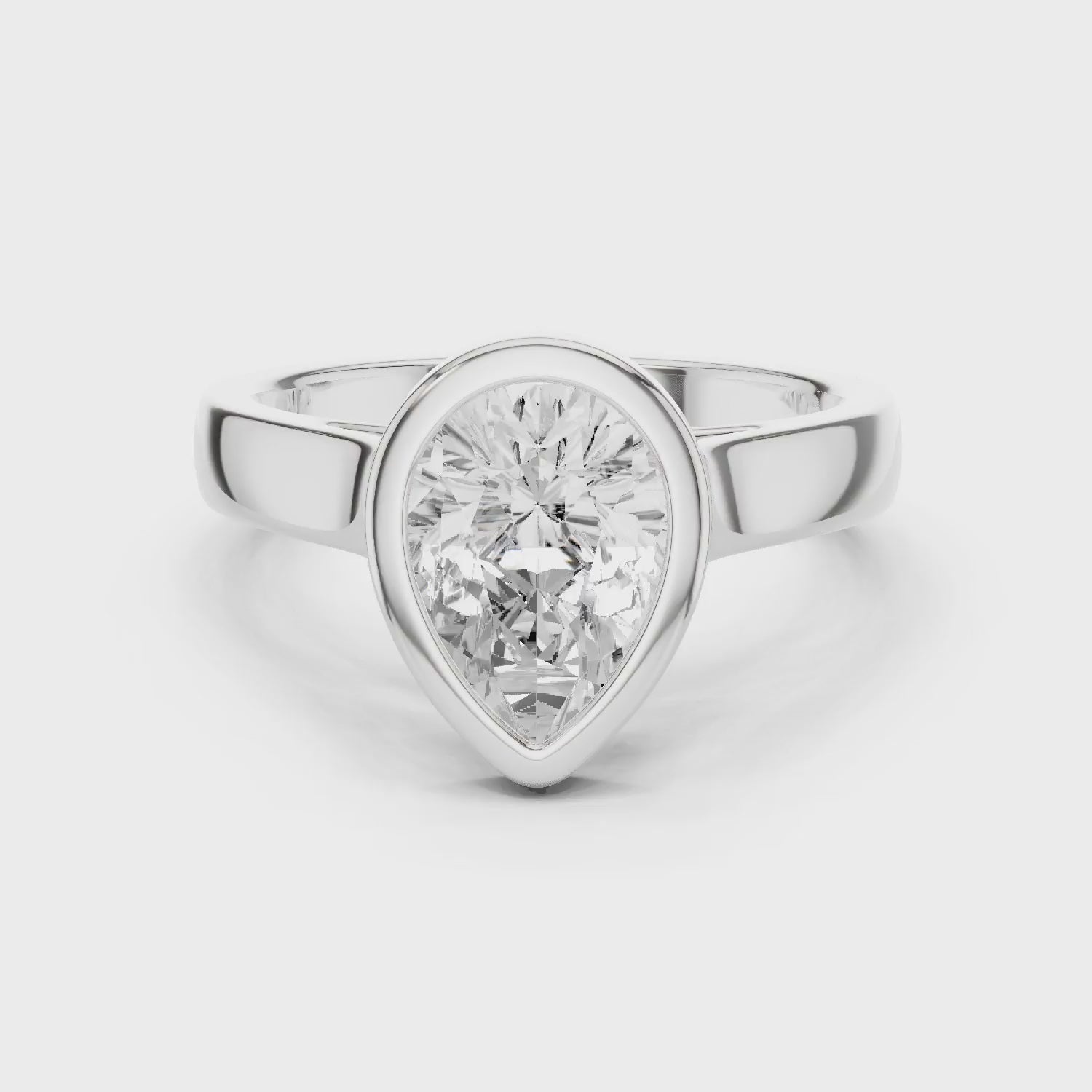 Pear Cut Diamond Bezel Solitaire Engagement Ring