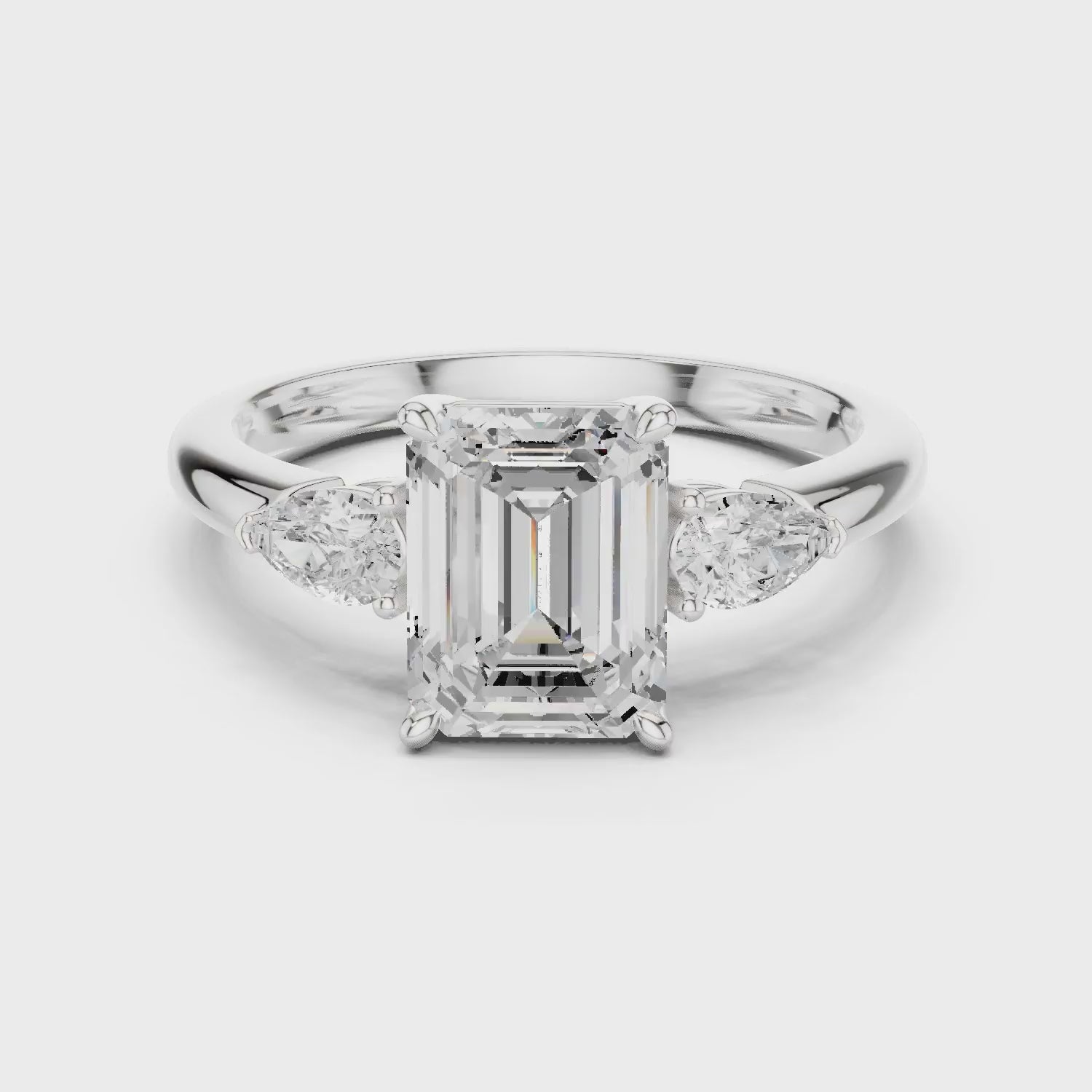 Emerald Cut Diamond Three-Stone Engagement Ring
