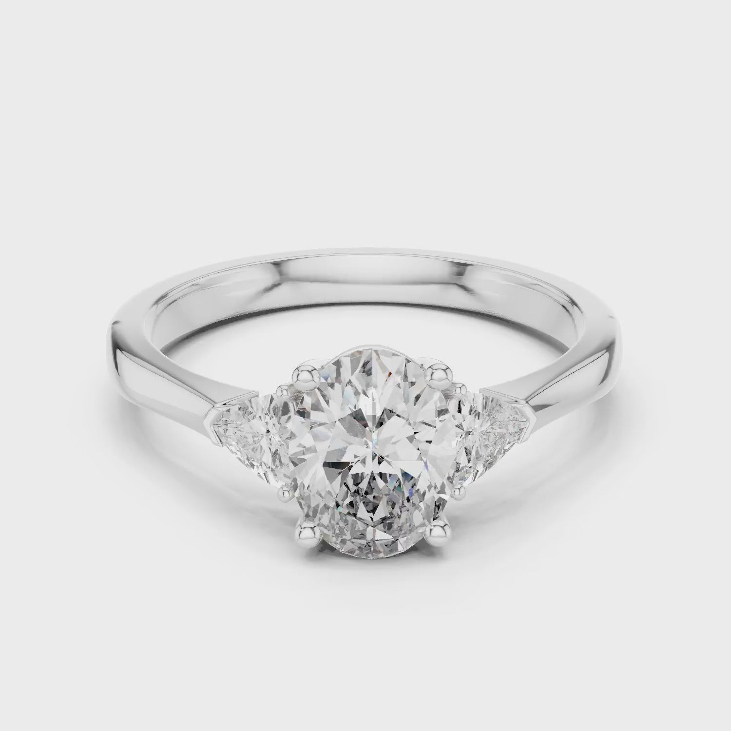 Trillion Side Stone Oval Diamond Engagement Ring