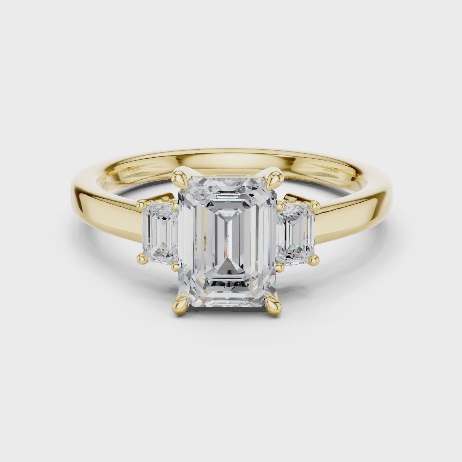 Emerald Cut Diamond Three-Stone Engagement Ring