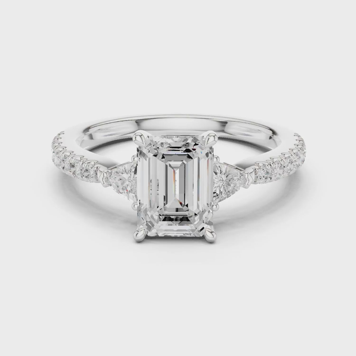 Emerald Cut Diamond Three-Stone Engagement Ring with Pave Band