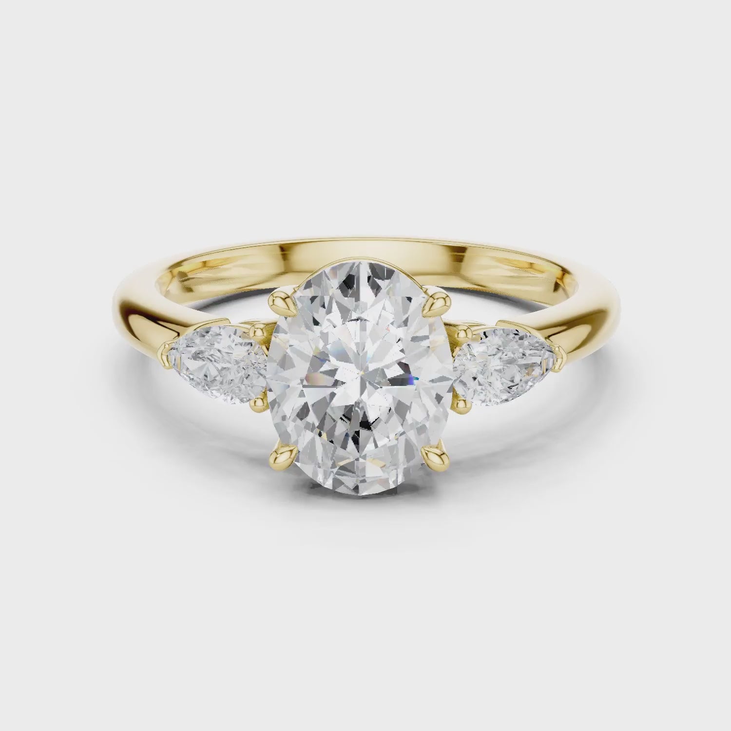 Oval Cut Diamond Three-Stone Engagement Ring