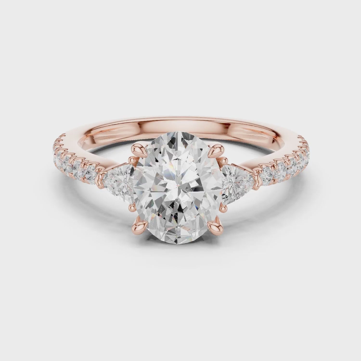 Oval Cut Diamond Three-Stone Engagement Ring with Pave Band