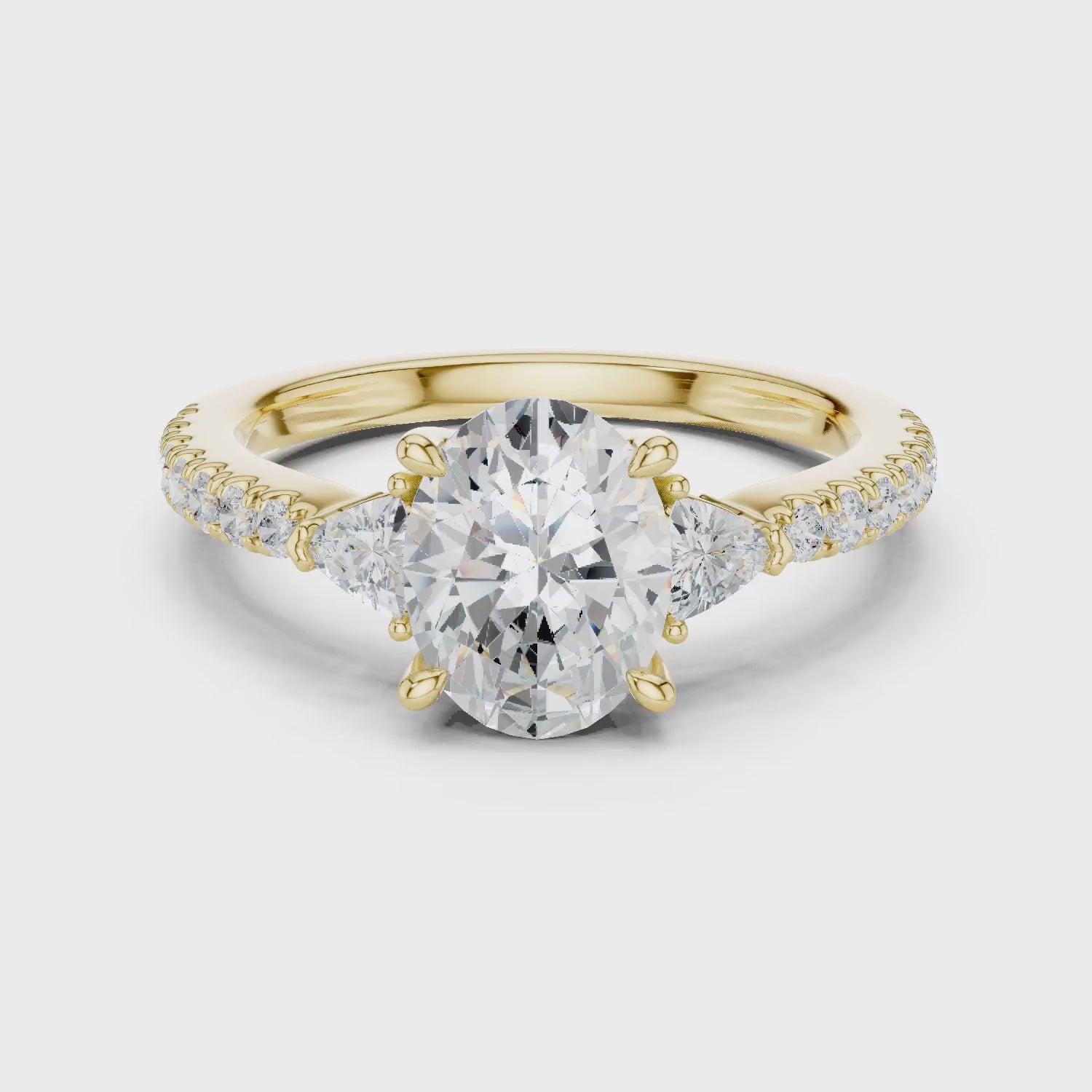 Oval Cut Diamond Three-Stone Engagement Ring with Pave Band